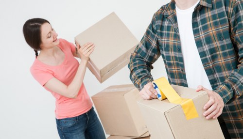 Moving van and removal crew preparing a home move in Maida Vale