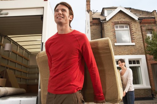Professional movers loading belongings for a West London relocation