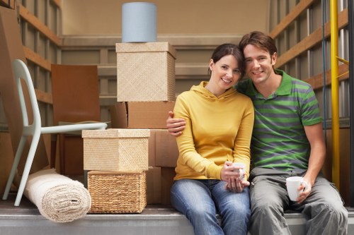 Packed boxes and furniture ready for a local removal service