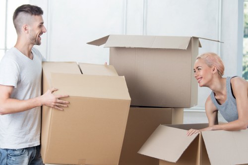 Local moving team handling furniture near Maida Vale streets