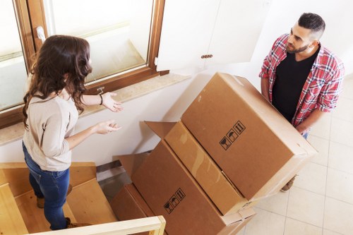 Boxes and furniture prepared for a flat move in Maida Vale