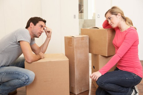 Local moving team handling furniture near Maida Vale streets