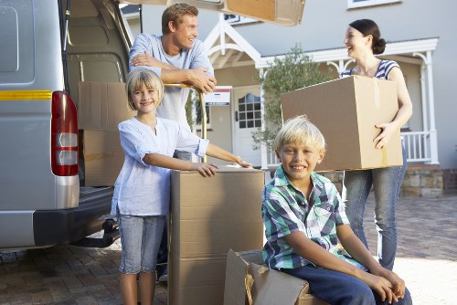 Removalists navigating a Maida Vale property with careful handling