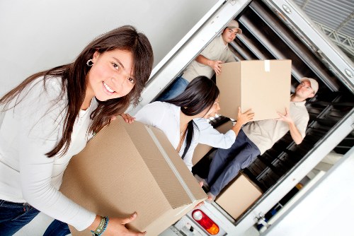 Local moving team assisting with furniture delivery for a Maida Vale home