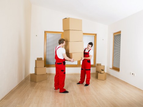 Careful furniture handling during a flat move in Maida Vale